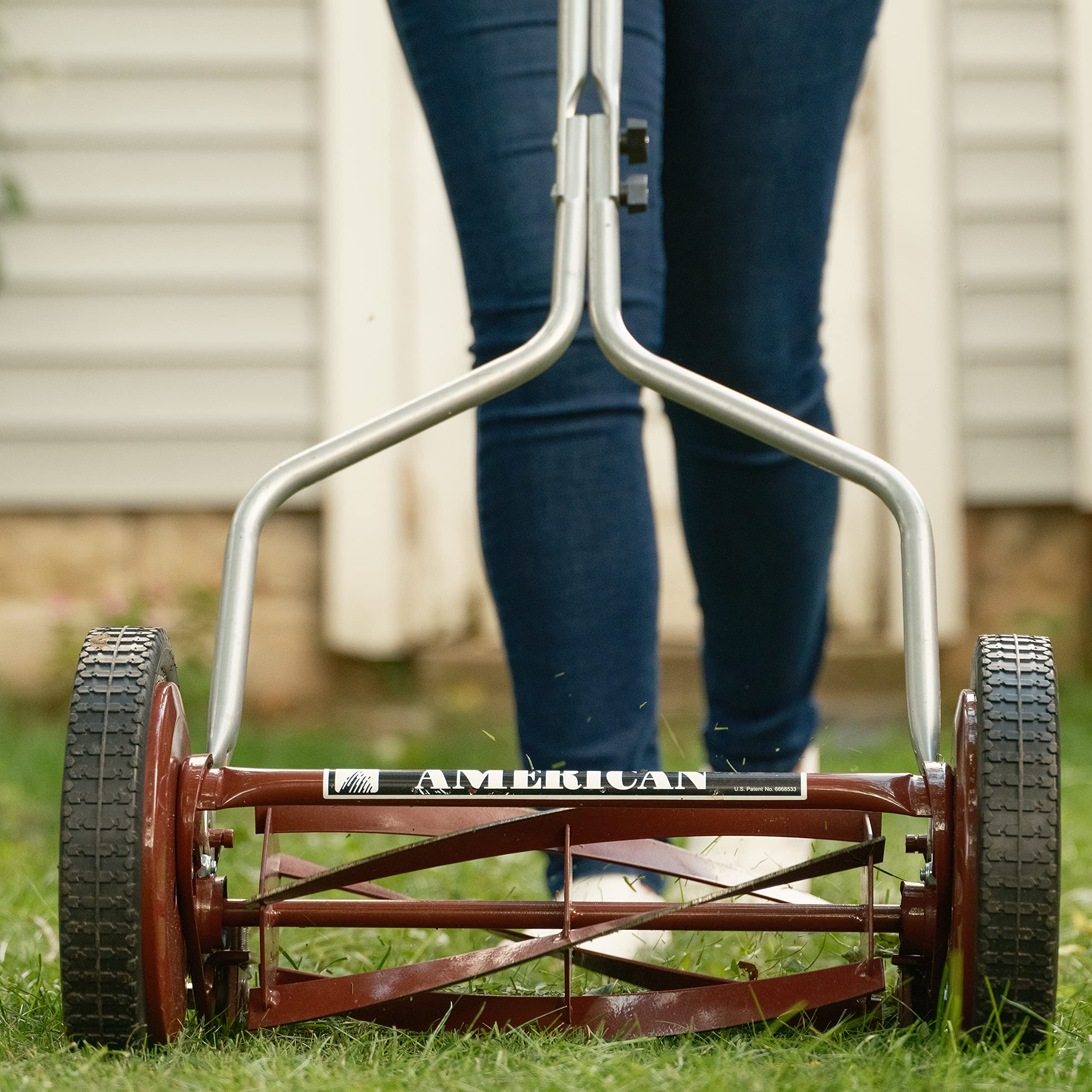 American Lawn Mower Company close-up of five-blade reel showing sharp alloy blades for precise cuts