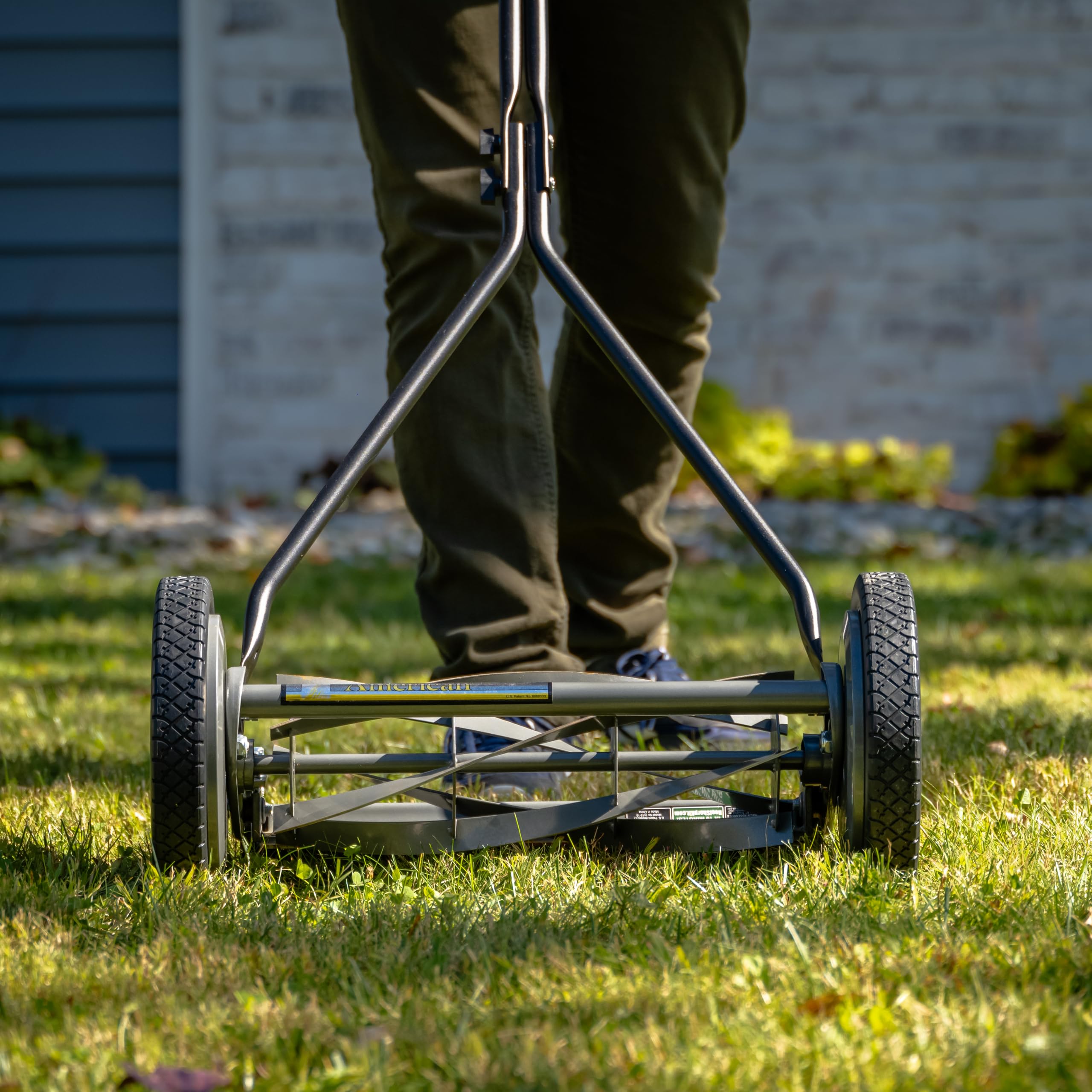 American Lawn Mower close-up of five-blade reel demonstrating precise scissor cut