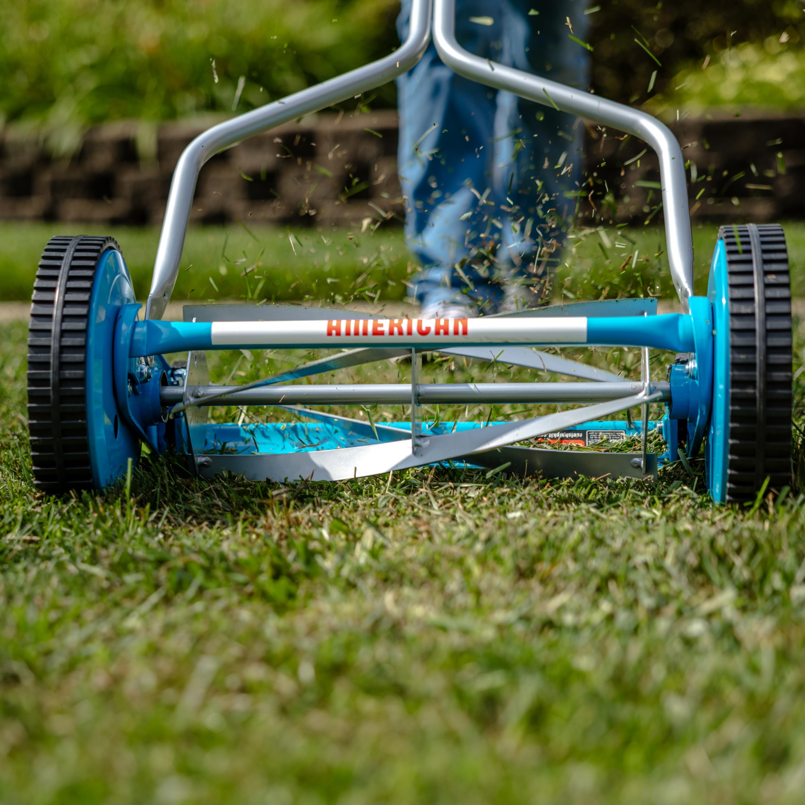 American Lawn Mower Company side profile highlighting lightweight frame for easy pushing