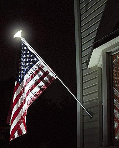 American Signature top-mounted on pole illuminating flag for clear nighttime visibility
