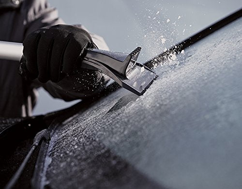 AMES brush in use clearing snow from an SUV roof for faster, safer removal