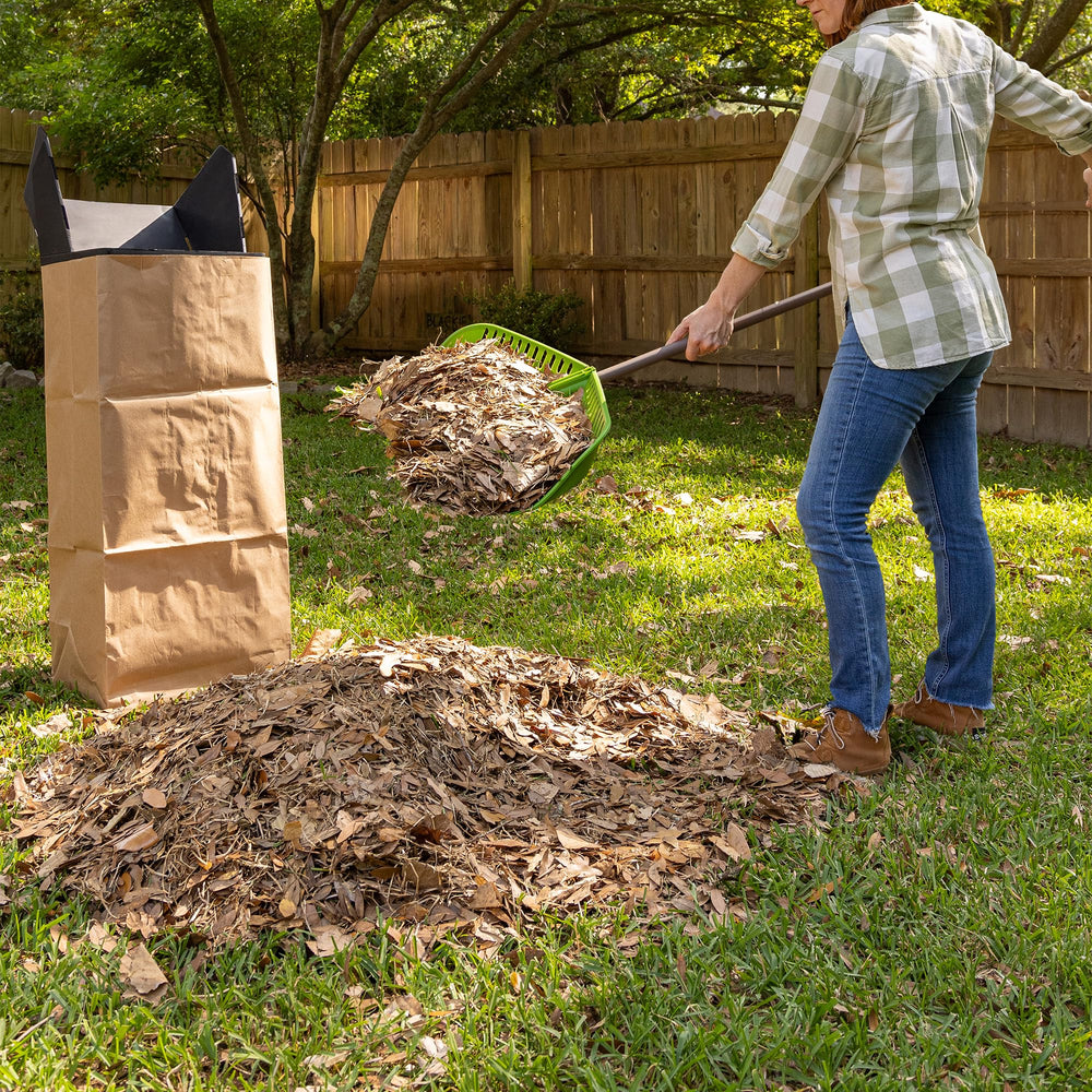 AMES rake in use gathering leaves into a pile for quicker yard work