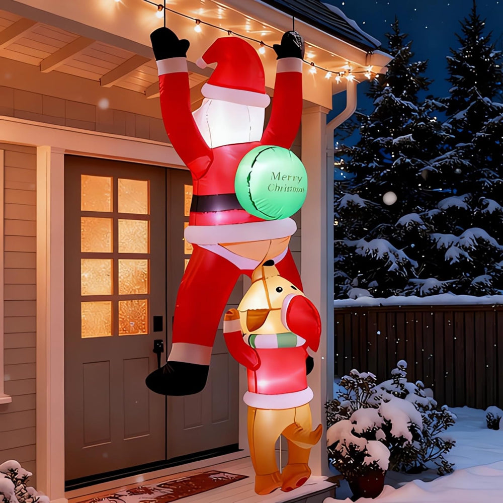 AMKAIO front view of hanging climbing Santa inflatable, playful curb appeal