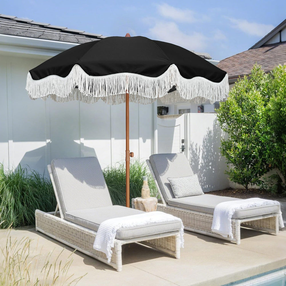 AMMSUN umbrella on beach providing portable sun protection