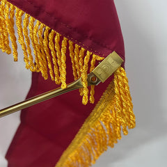 AMZFLAG spreaders mounted on an indoor pole demonstrating stable flag support