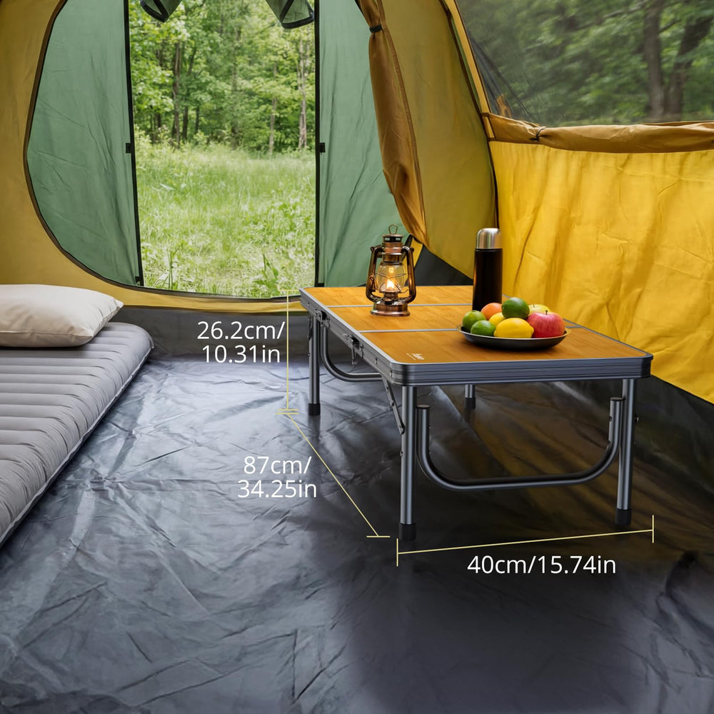 Anbte folded table packed with handle in bag for quick transport convenience
