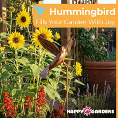 Ancient Graffiti hummingbird staked in garden demonstrating vertical accent and durability
