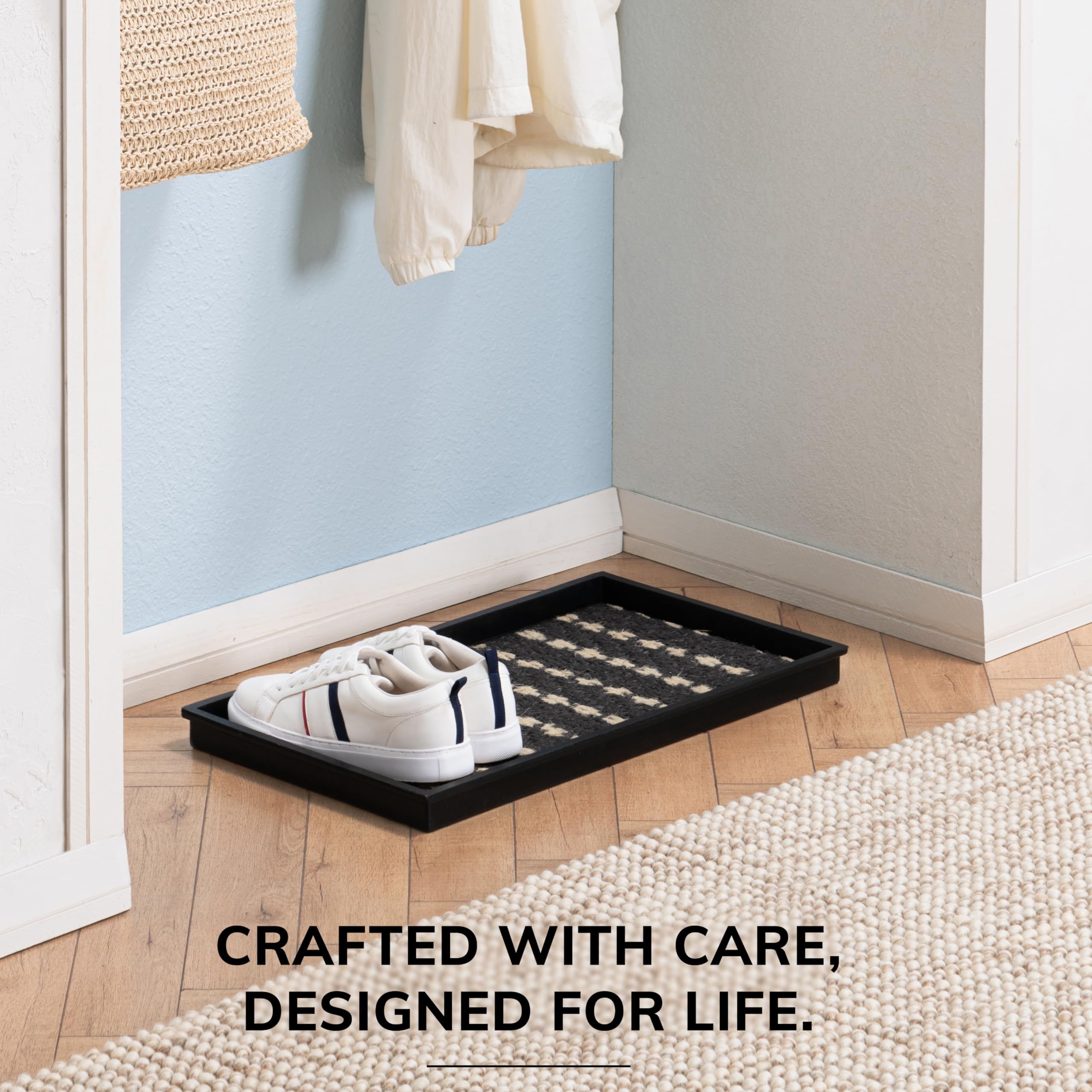 Anji Mountain removable coir insert lifted to expose rubber base for easy cleaning