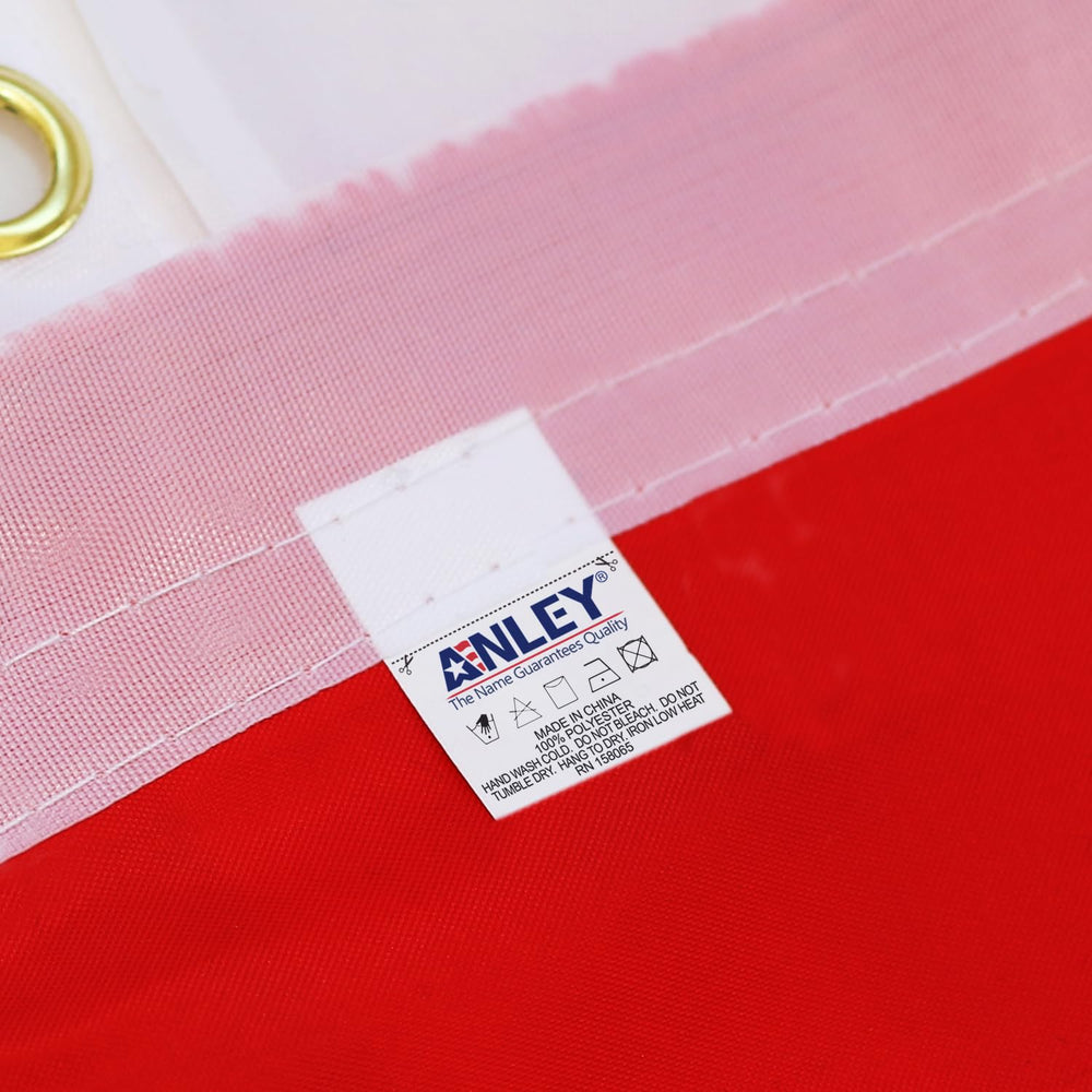 Anley canvas header and brass grommet close-up showing reinforced hanging strength