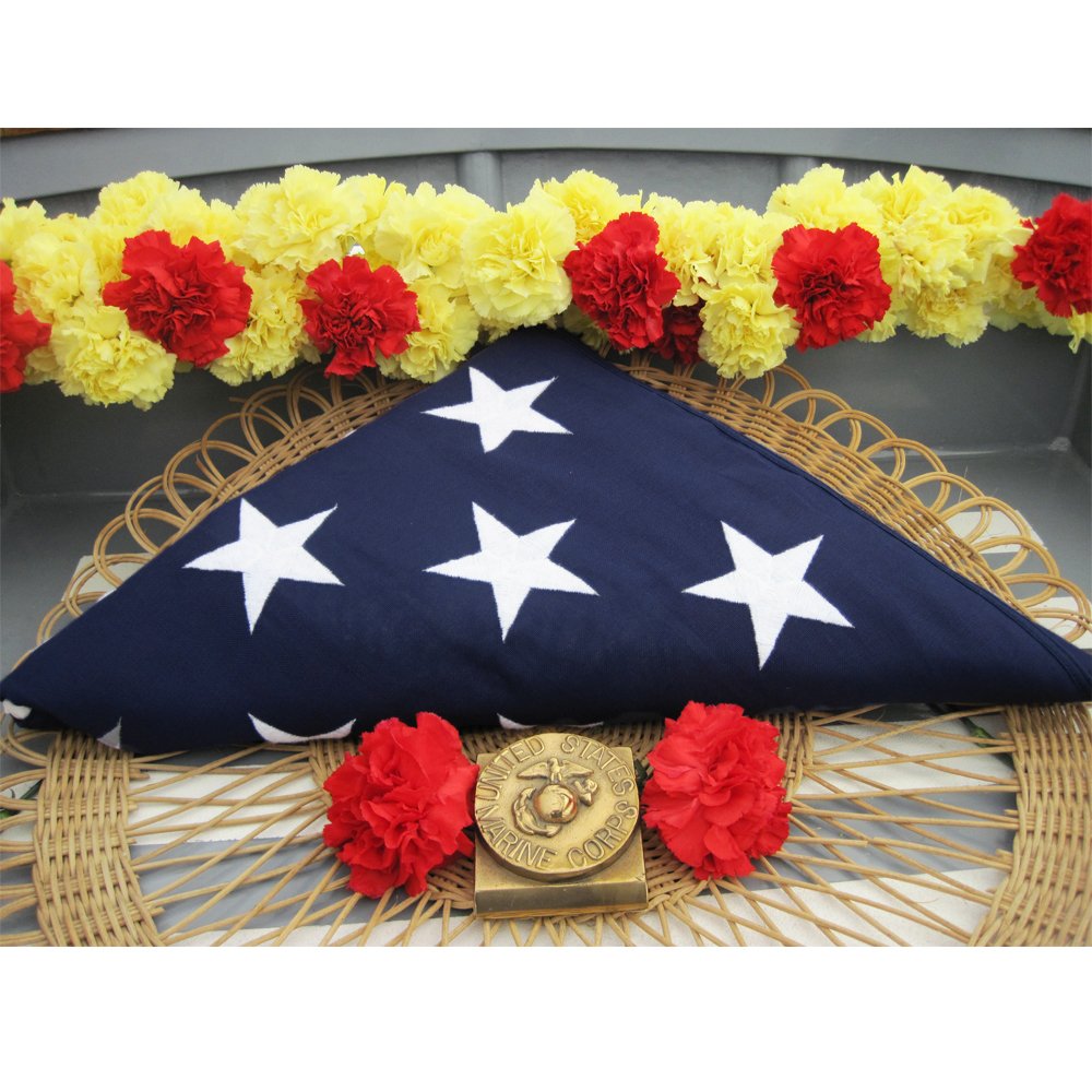 Anley flag draped on casket showing respectful ceremonial presentation