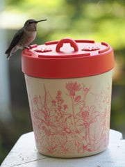 Anna's Healthy Hummingbird feeder held in hand for size comparison, compact and portable benefit