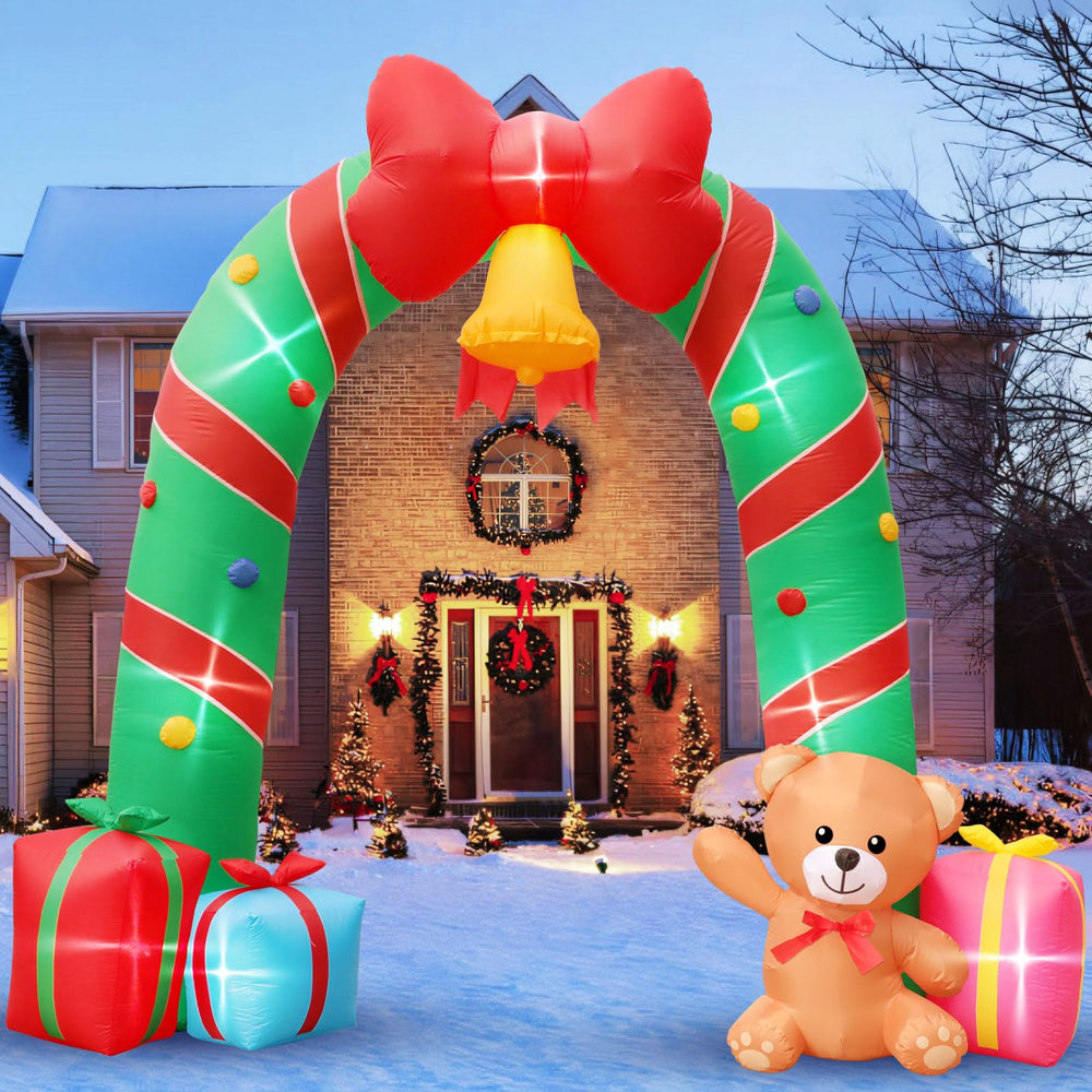 anroog front view of candy cane archway creating a grand holiday entrance