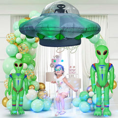 anroog inflated aliens next to person for scale and visual impact