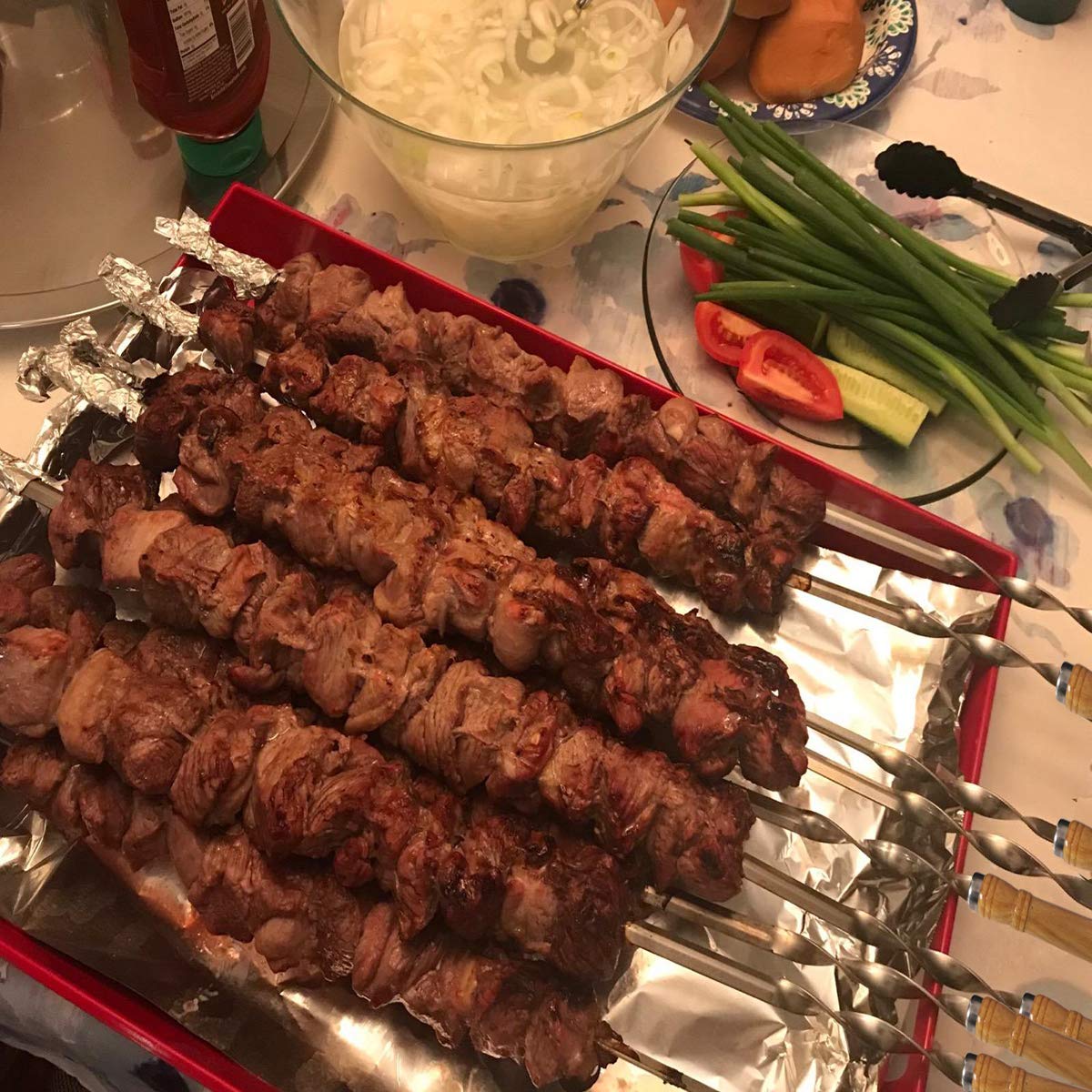 Antallcky skewer used over campfire showing portable outdoor cooking