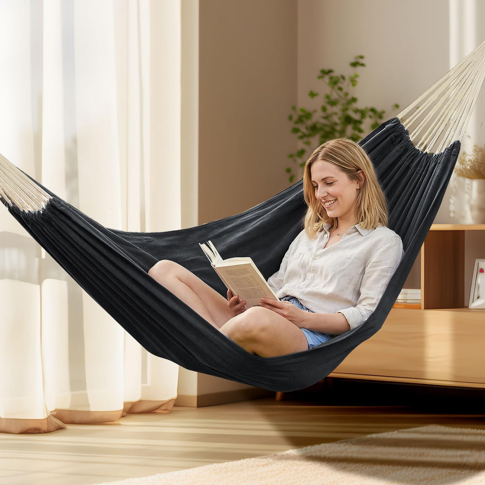 ANYOO on hammock stand in backyard showing relaxing home lifestyle use