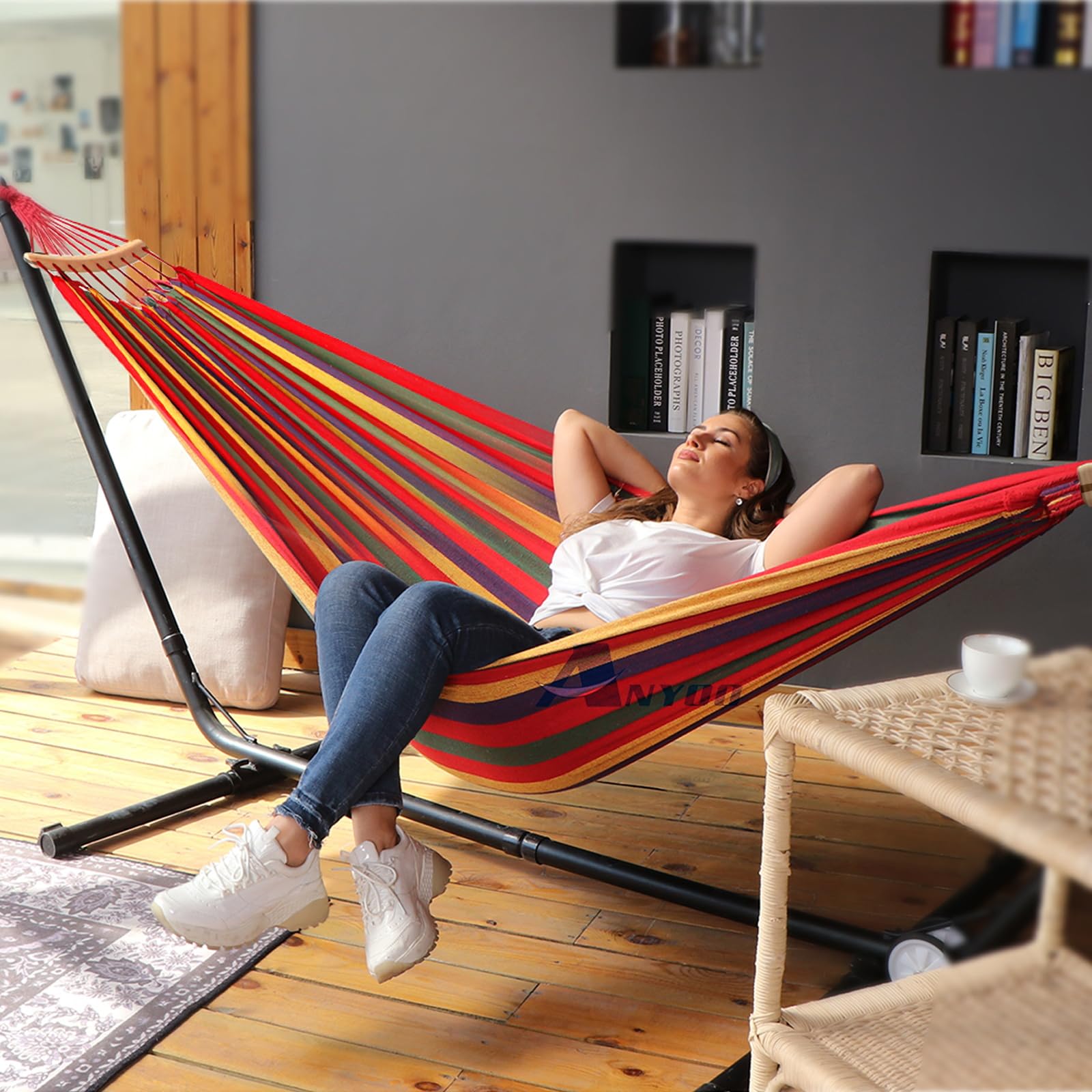 ANYOO hammock with person for scale showing generous size and 450 lb capacity