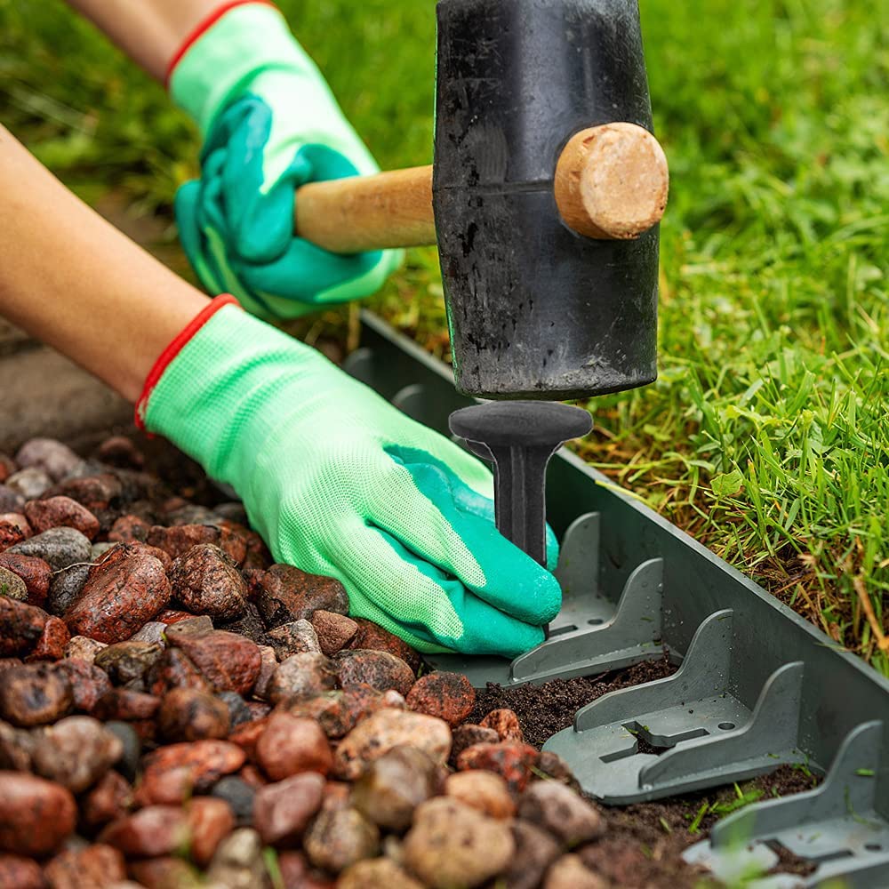 Aoipend stakes used in a garden scene securing tarp and turf quickly