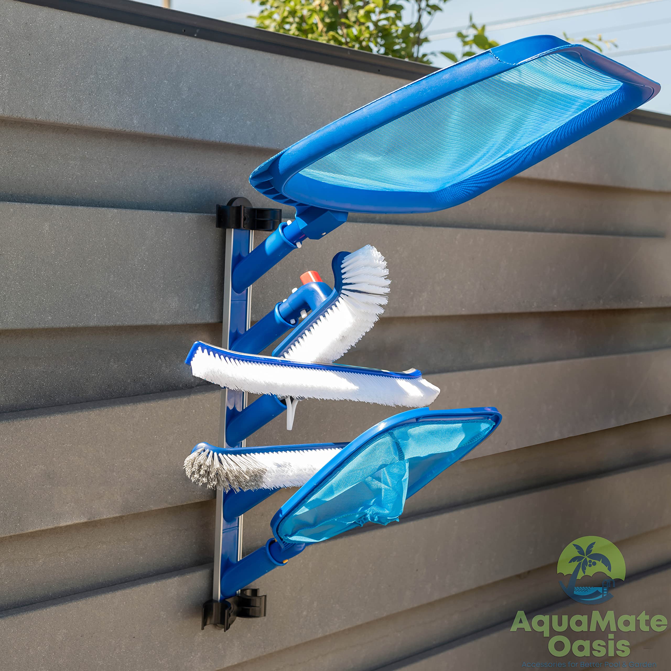 AquaMate Oasis holding skimmer, brushes, vacuum head and poles for quick access