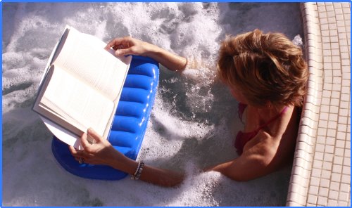 AquaReader supporting an open book to show ergonomic hand-rest comfort benefit