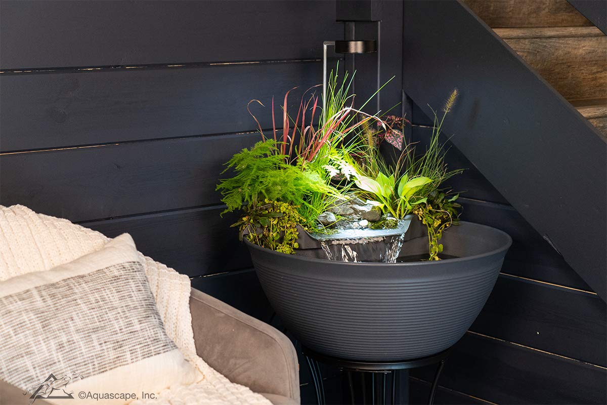 Aquascape stand on patio with AquaGarden showing elevated water feature for outdoor ambiance