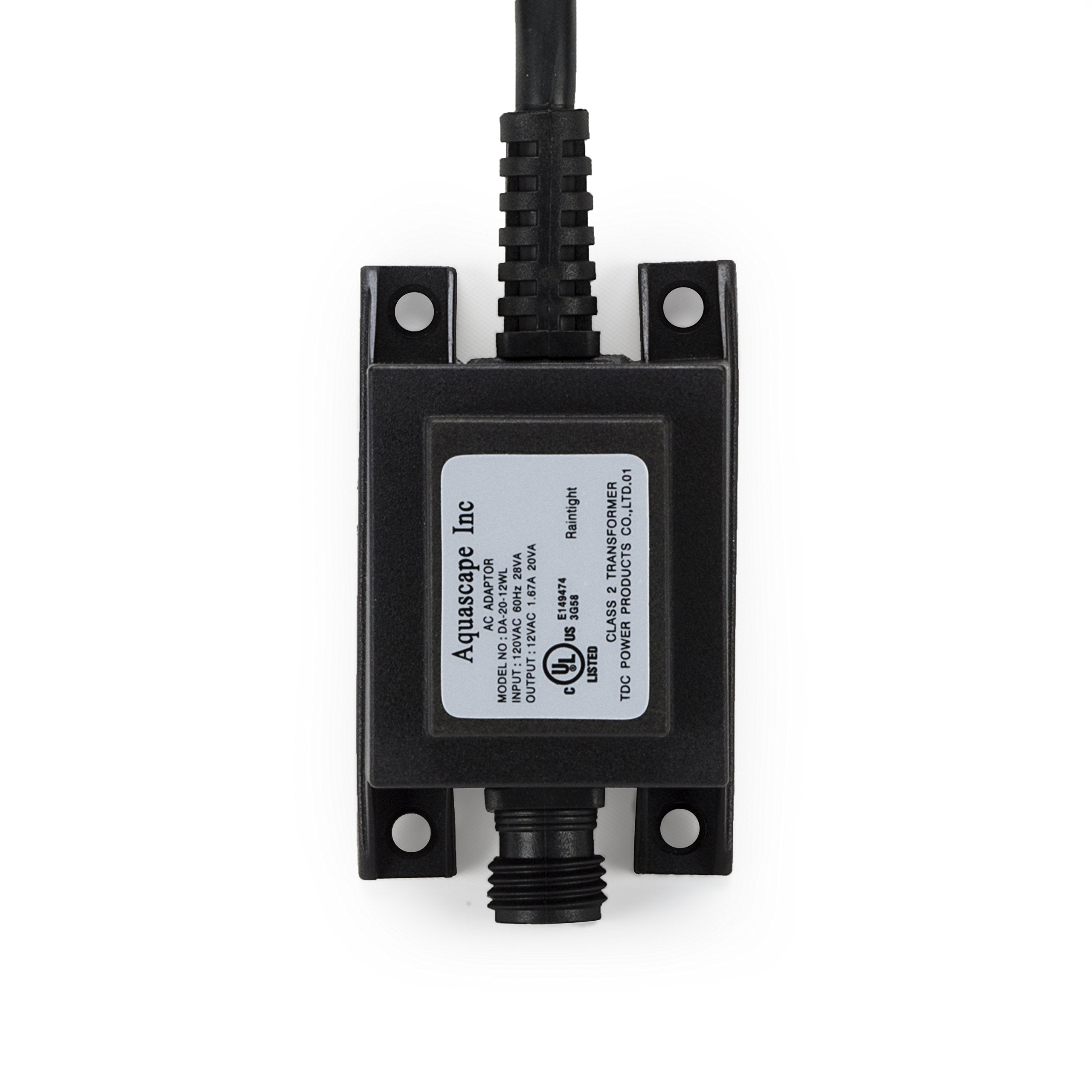 Aquascape transformer installed beside pond and waterfall providing reliable low-voltage lighting