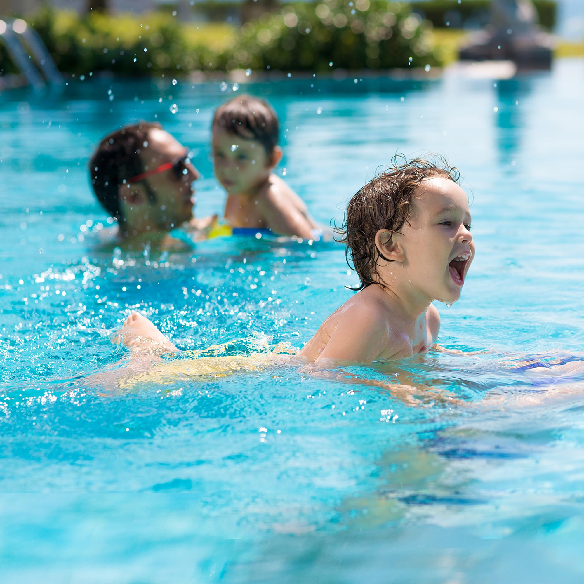 AQUIVEX cartridge poolside lifestyle photo showing clearer water and maintenance ease