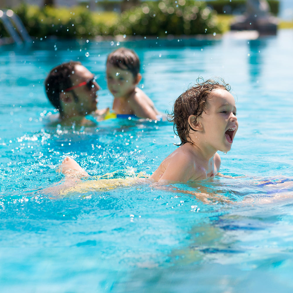 AQUIVEX cartridge poolside lifestyle photo showing clearer water and maintenance ease