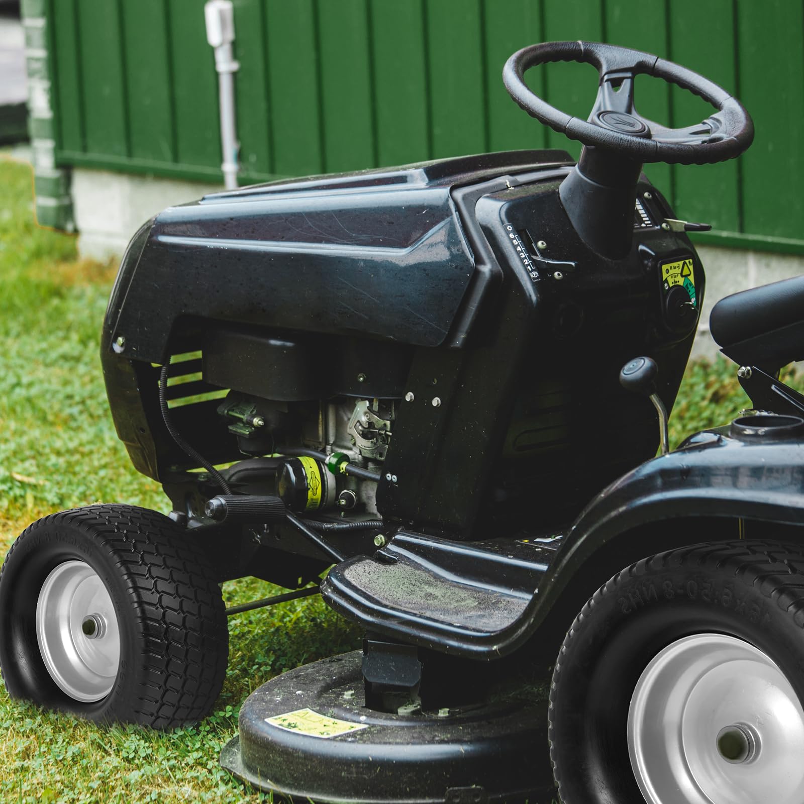AR-PRO installed on lawn tractor in yard showing clean cut and turf protection benefit