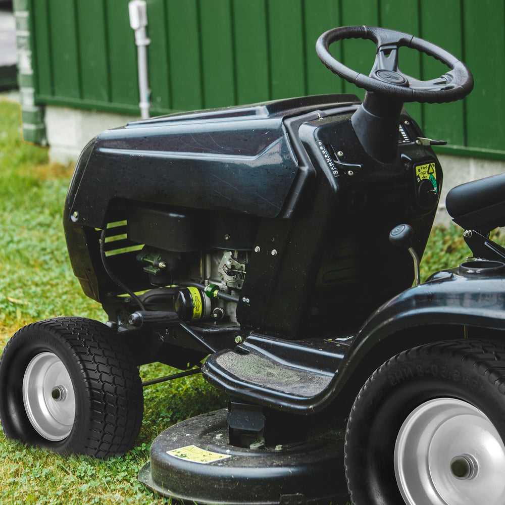 AR-PRO installed on lawn tractor in yard showing clean cut and turf protection benefit