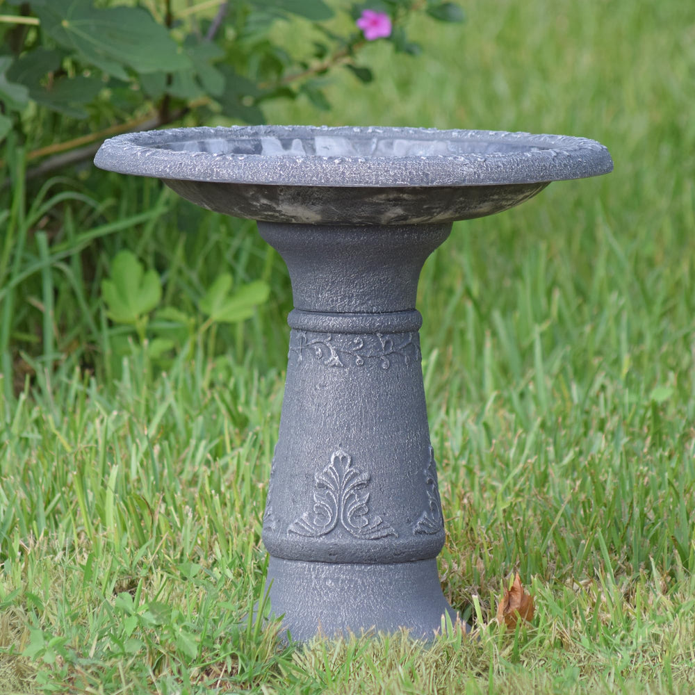 Arcadia Garden Products bird bath placed in a garden setting attracting wildlife nearby