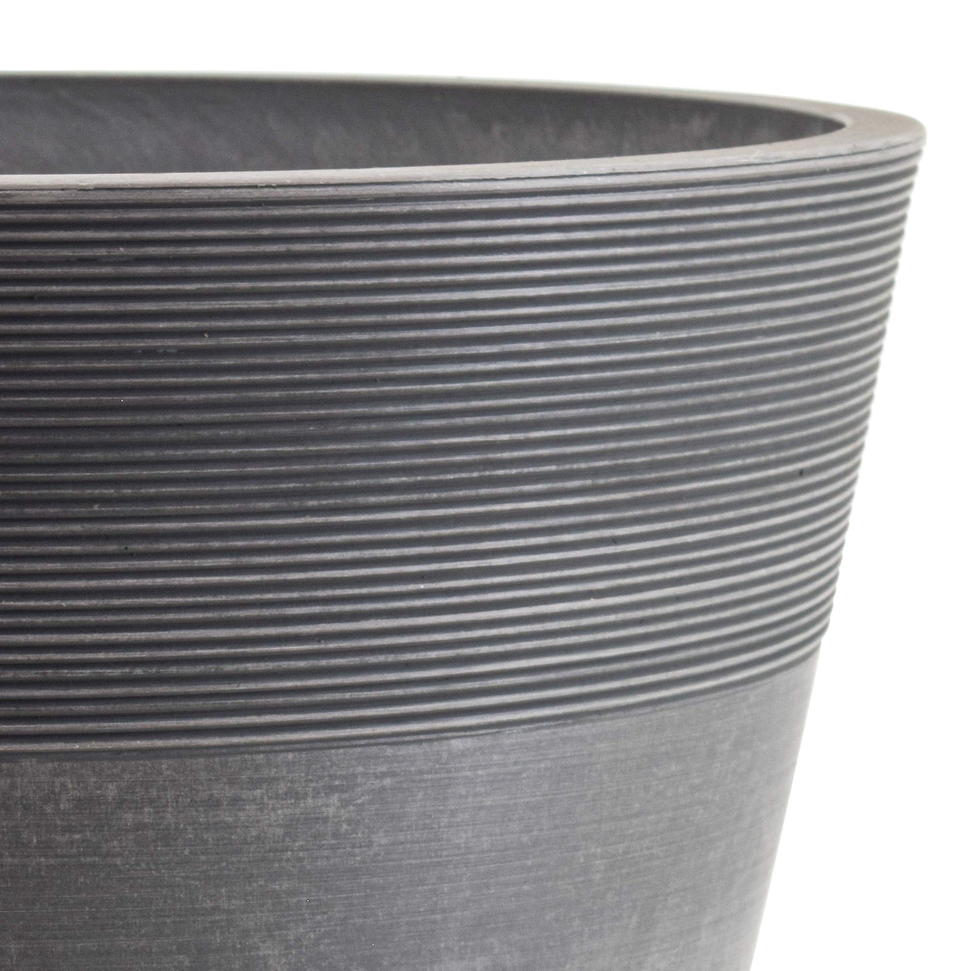 Arcadia Garden Products etched pot staged with trailing plants illustrating decorative impact