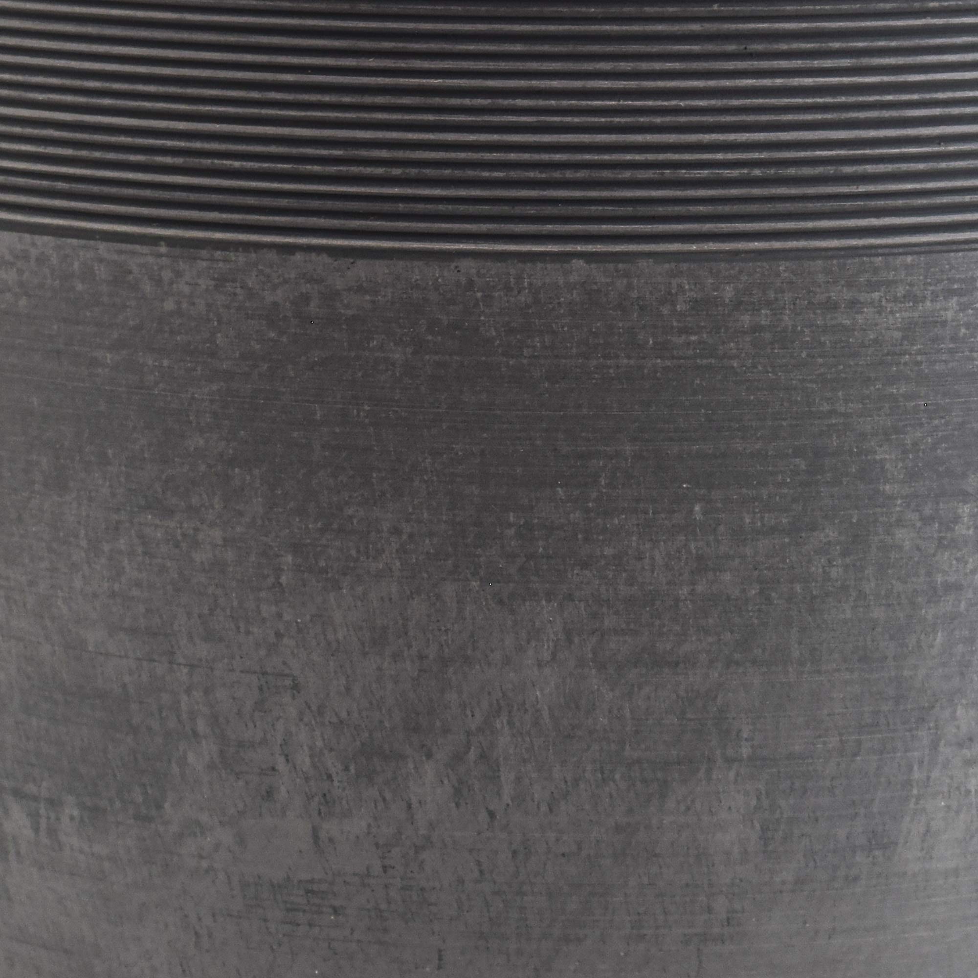 Arcadia Garden PSW pot next to a chair showing scale and lightweight portability