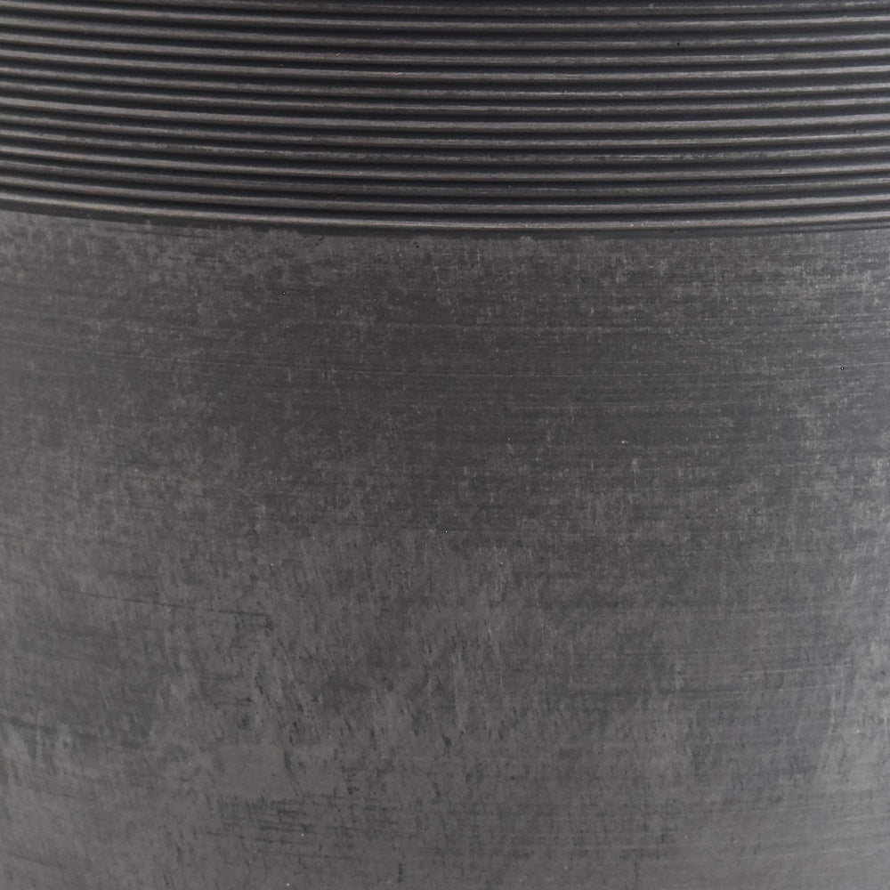 Arcadia Garden PSW pot next to a chair showing scale and lightweight portability