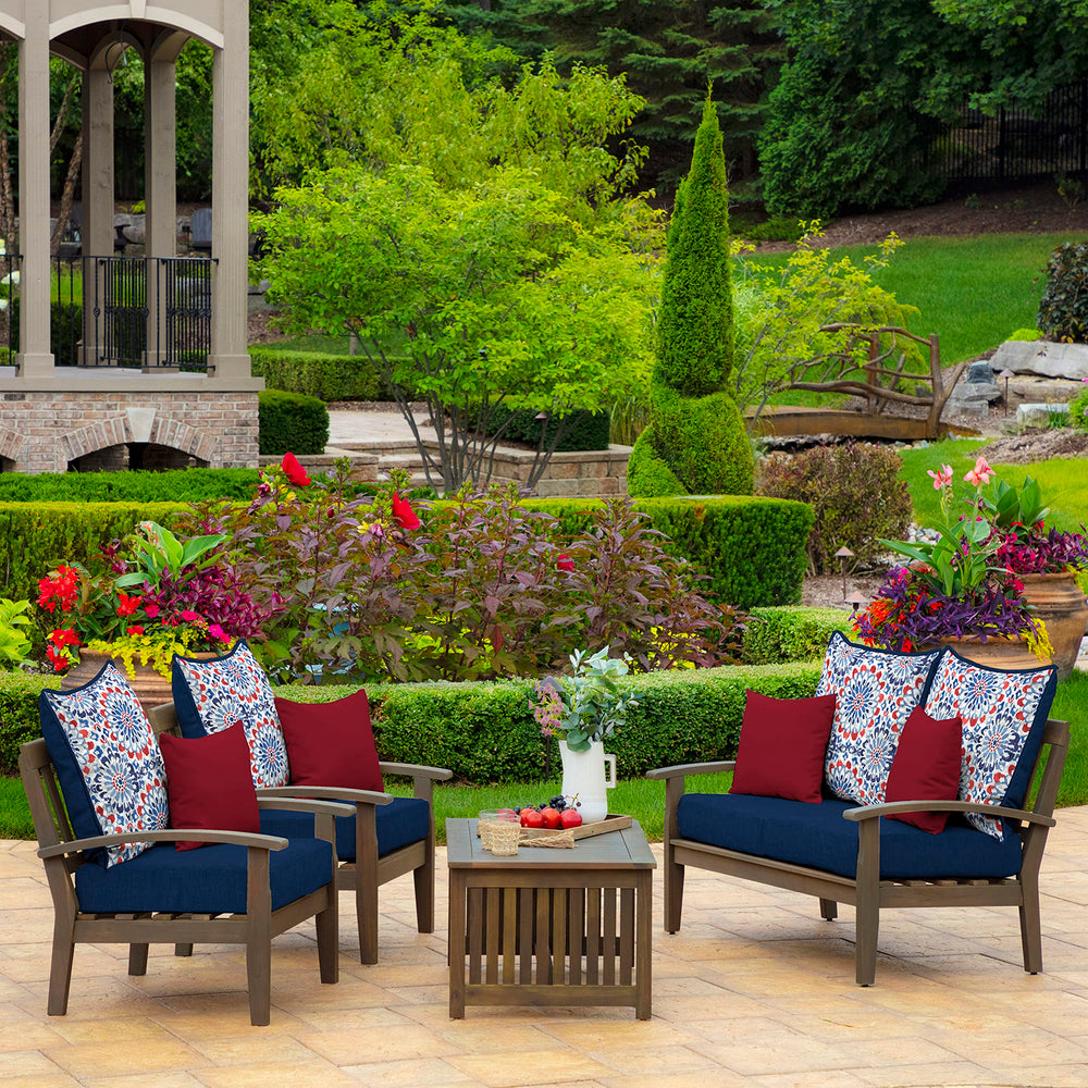 Arden Selections cushion next to chair showing 24x24 size and scale advantage