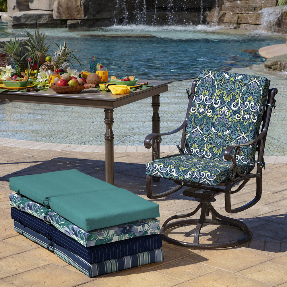 Arden Selections cushions styled on patio table and chairs conveying comfortable dining ambiance
