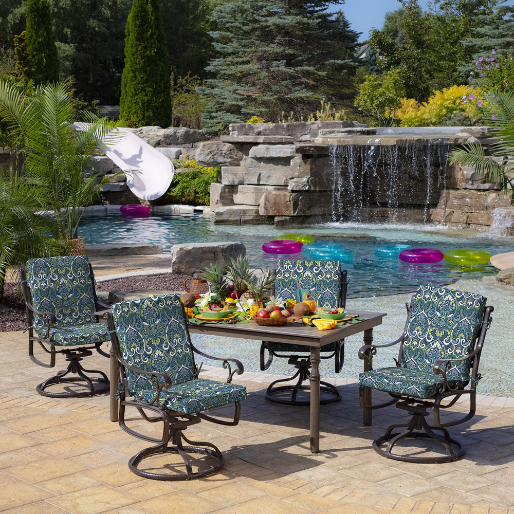 Arden Selections cushion set on a chair to show scale and fit with standard dining frames