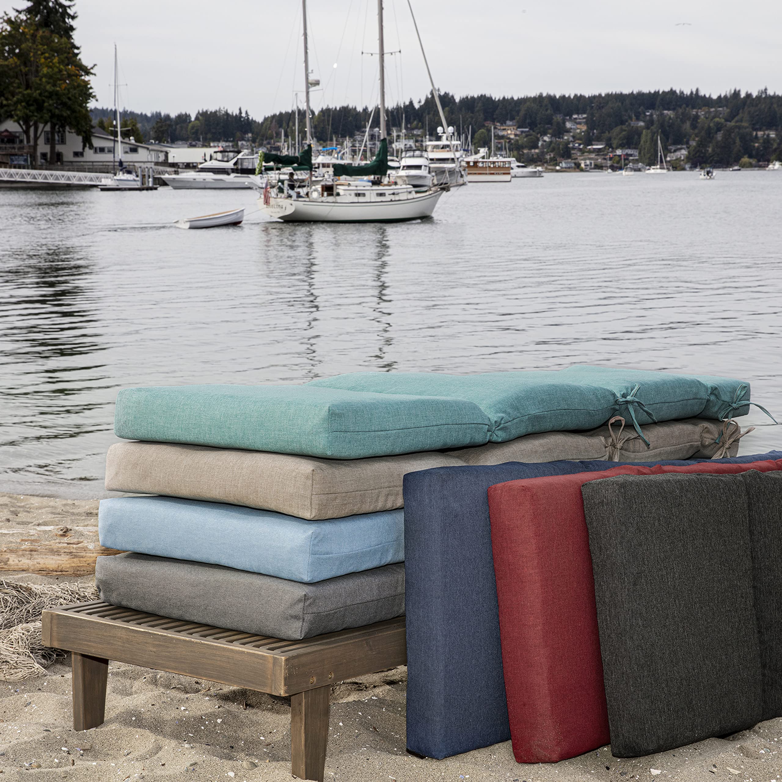 Arden Selections chaise cushion in use poolside adding vibrant comfort