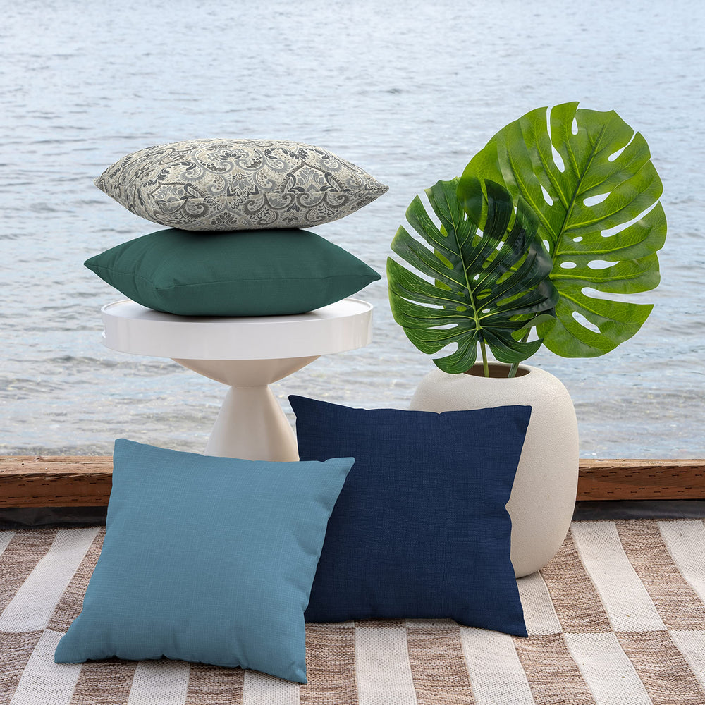 Arden Selections pillows stacked on sectional showing color contrast and comfort
