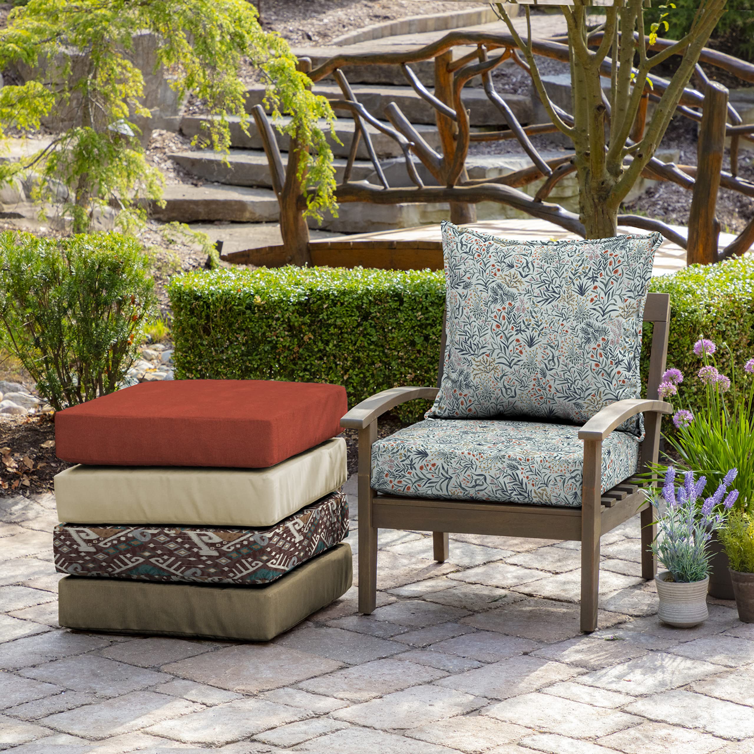 Arden Selections pistachio lifestyle porch setup showing botanical cushions enhancing outdoor decor