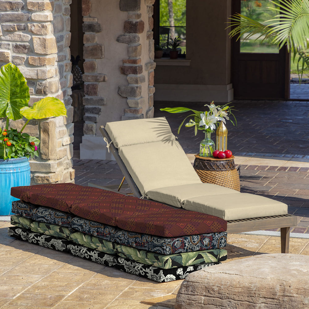 Arden Selections chaise cushion styled on patio showing upgraded outdoor seating