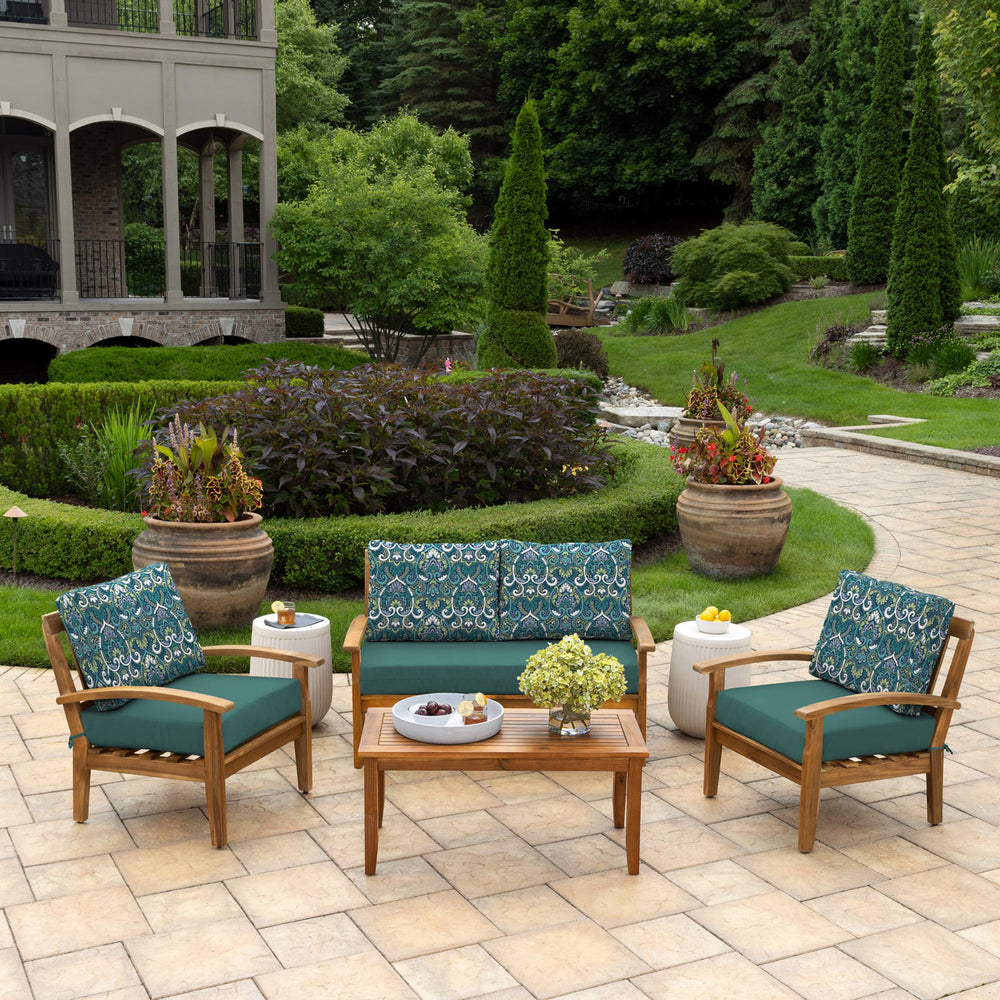 Arden Selections cushions in use on wooden loveseat showing weather readiness