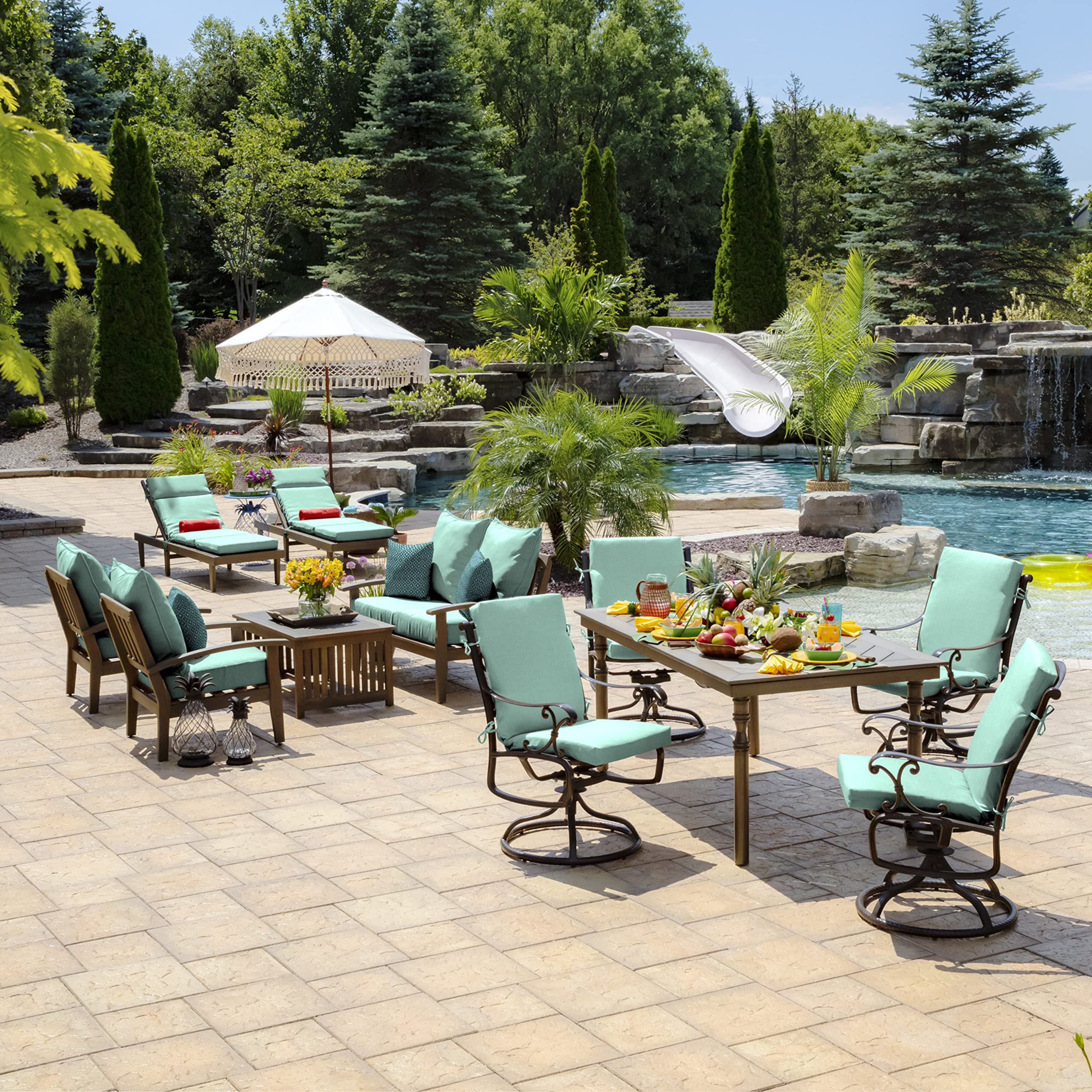 Arden Selections lifestyle patio setting with aqua cushions creating inviting outdoor space