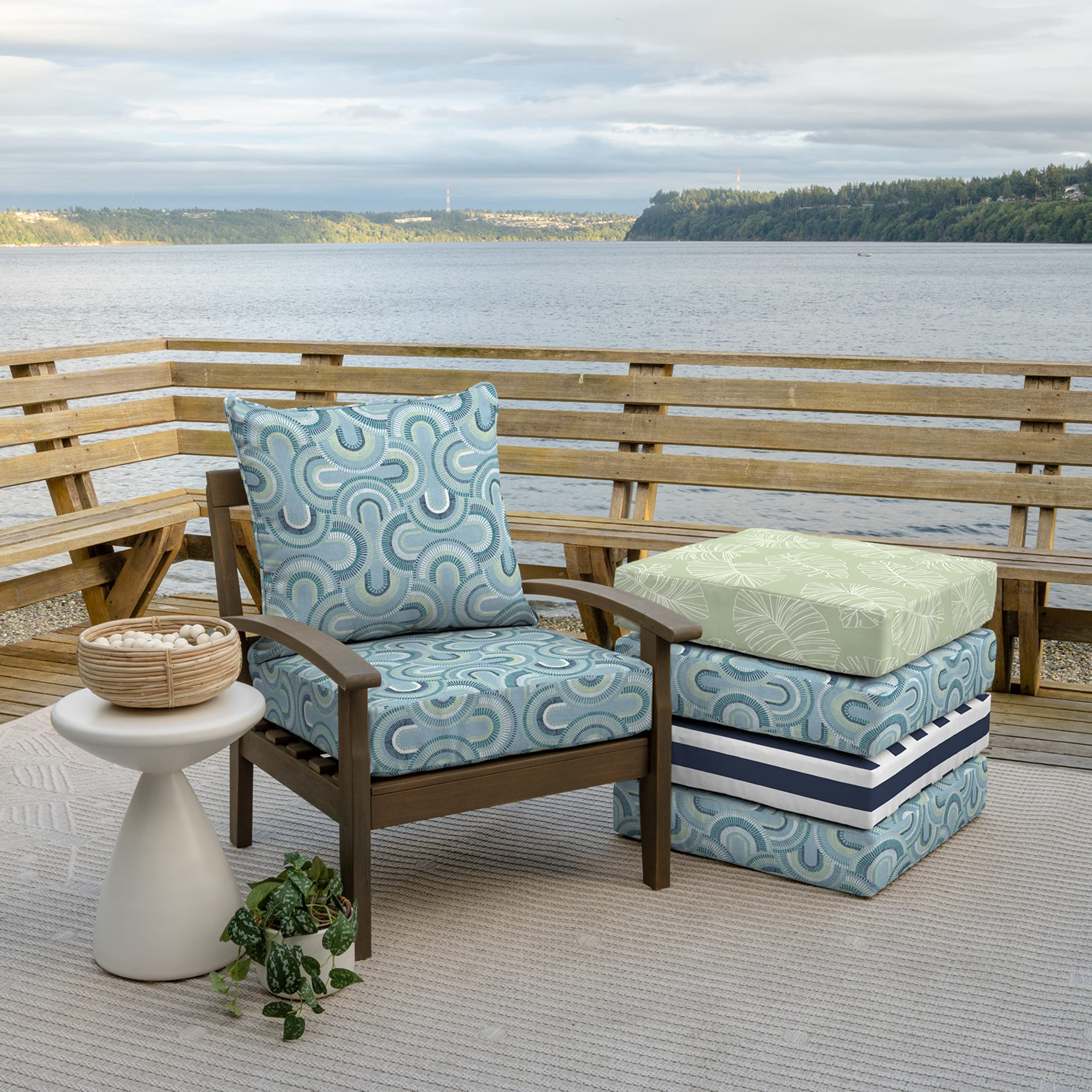 Arden Selections lifestyle patio scene showing cushions enhancing outdoor dining comfort