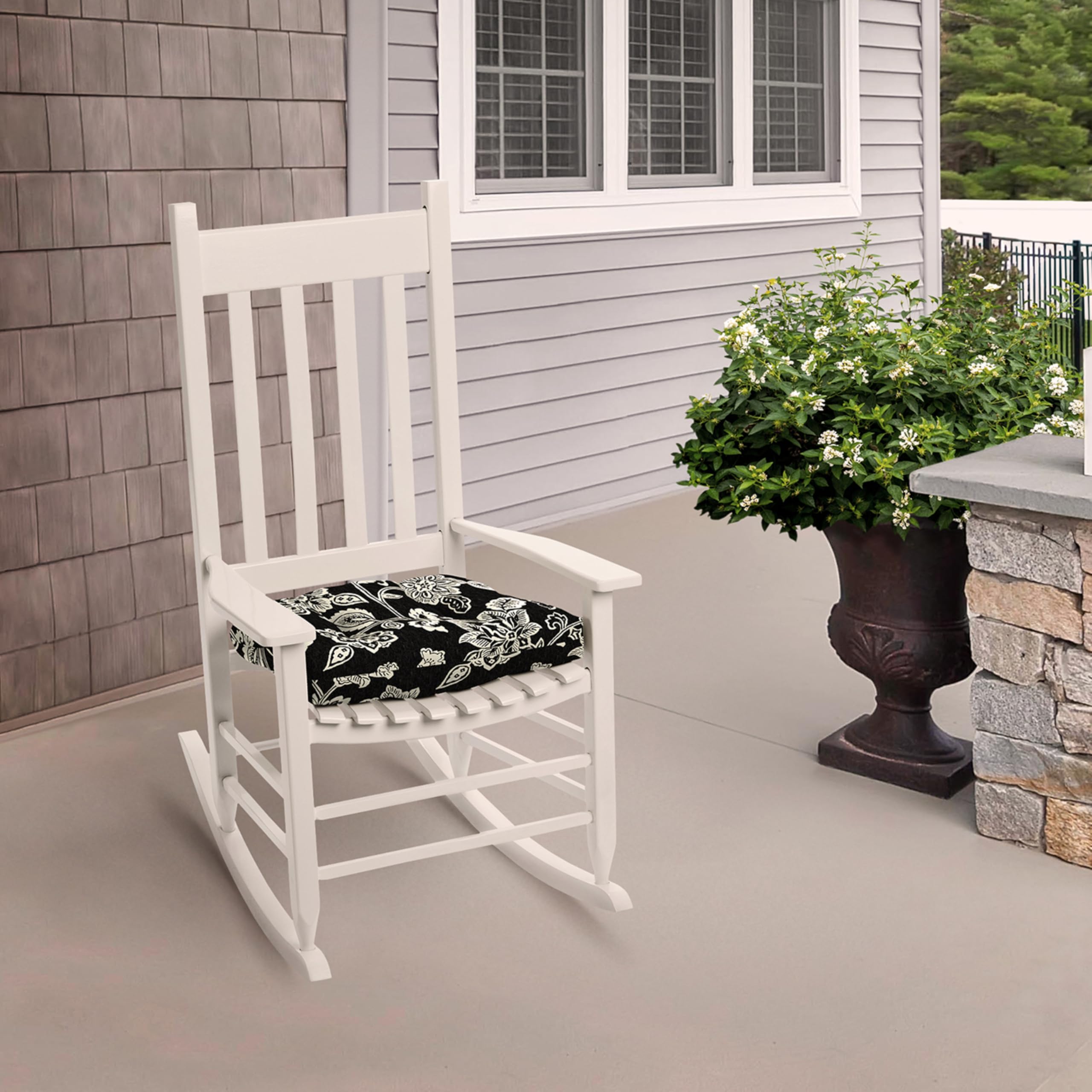 Arden Selections cushions in a porch scene showing weather-ready aesthetic and use
