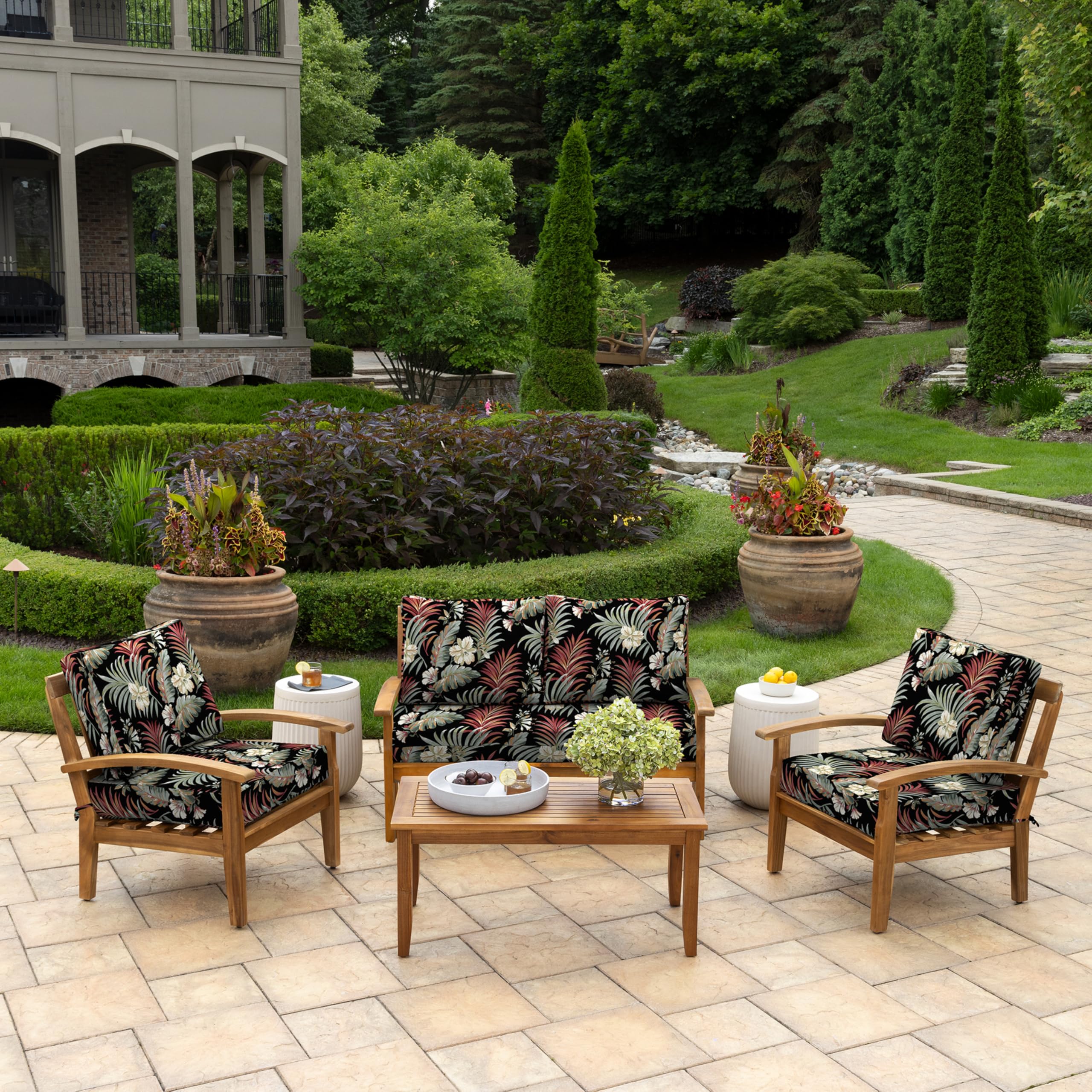 Arden Selections loveseat cushions styled on a patio loveseat demonstrating comfort and style