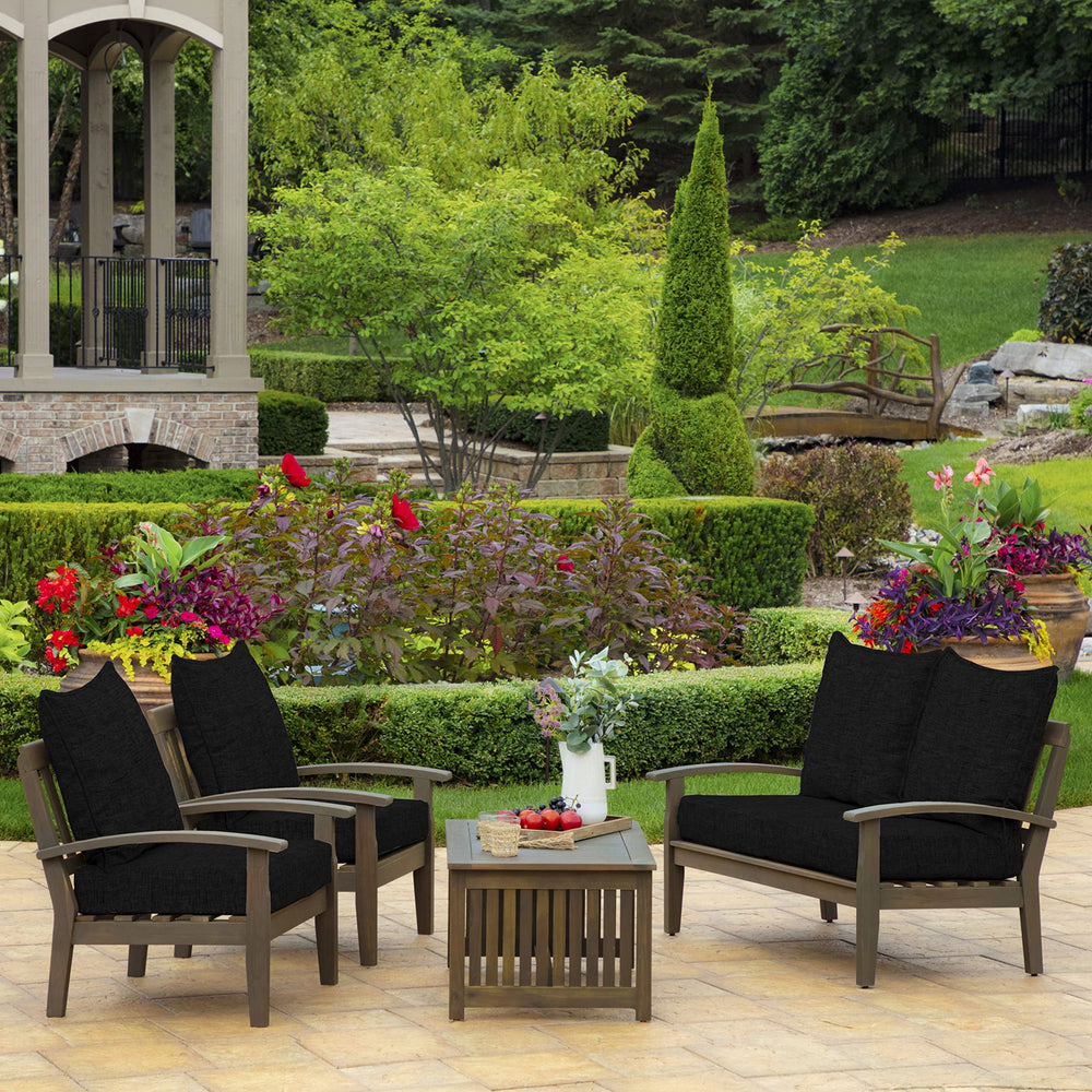 Arden Selections staged on patio sofa illustrating outdoor-ready comfort for entertaining