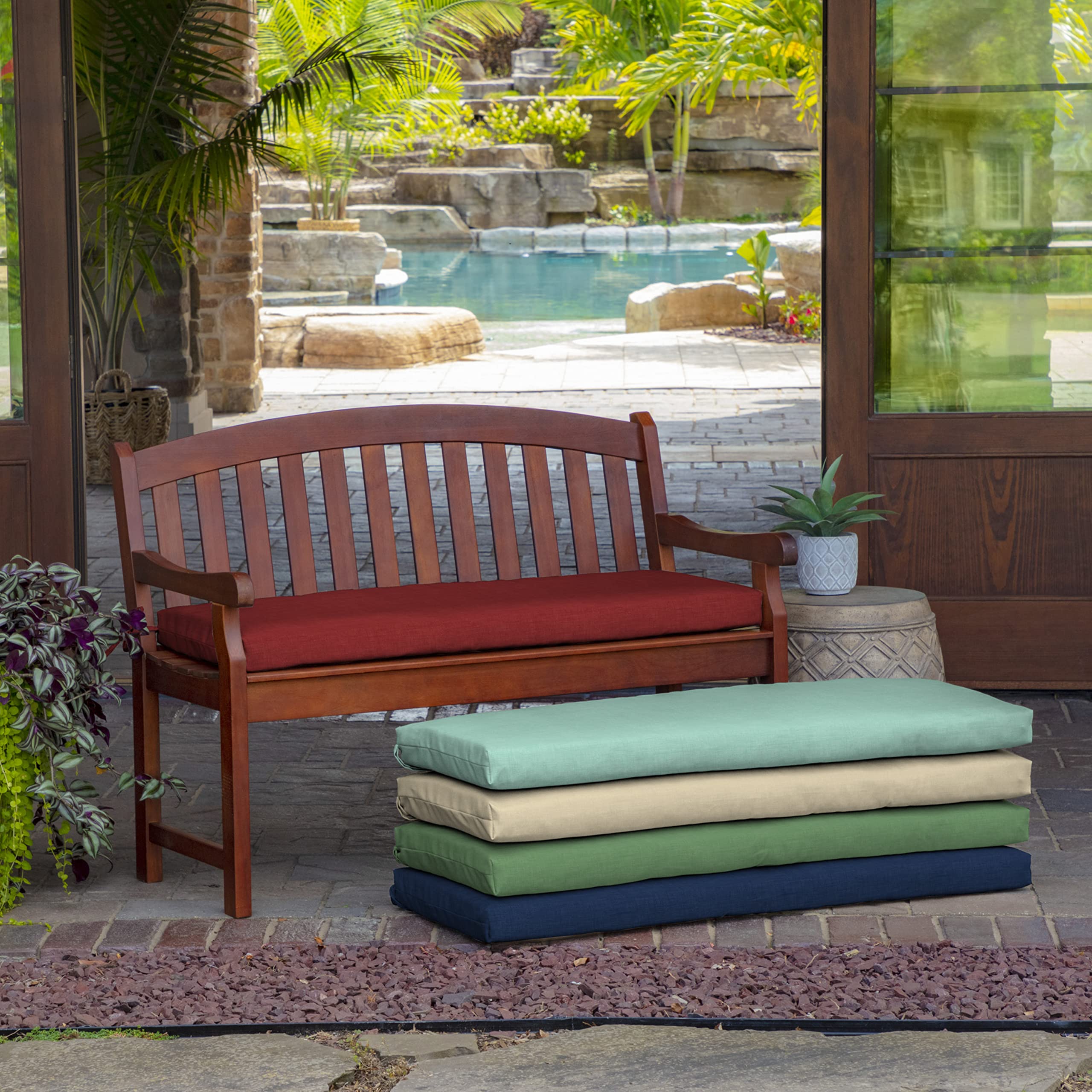 Arden Selections cushion on porch bench conveying comfortable outdoor style