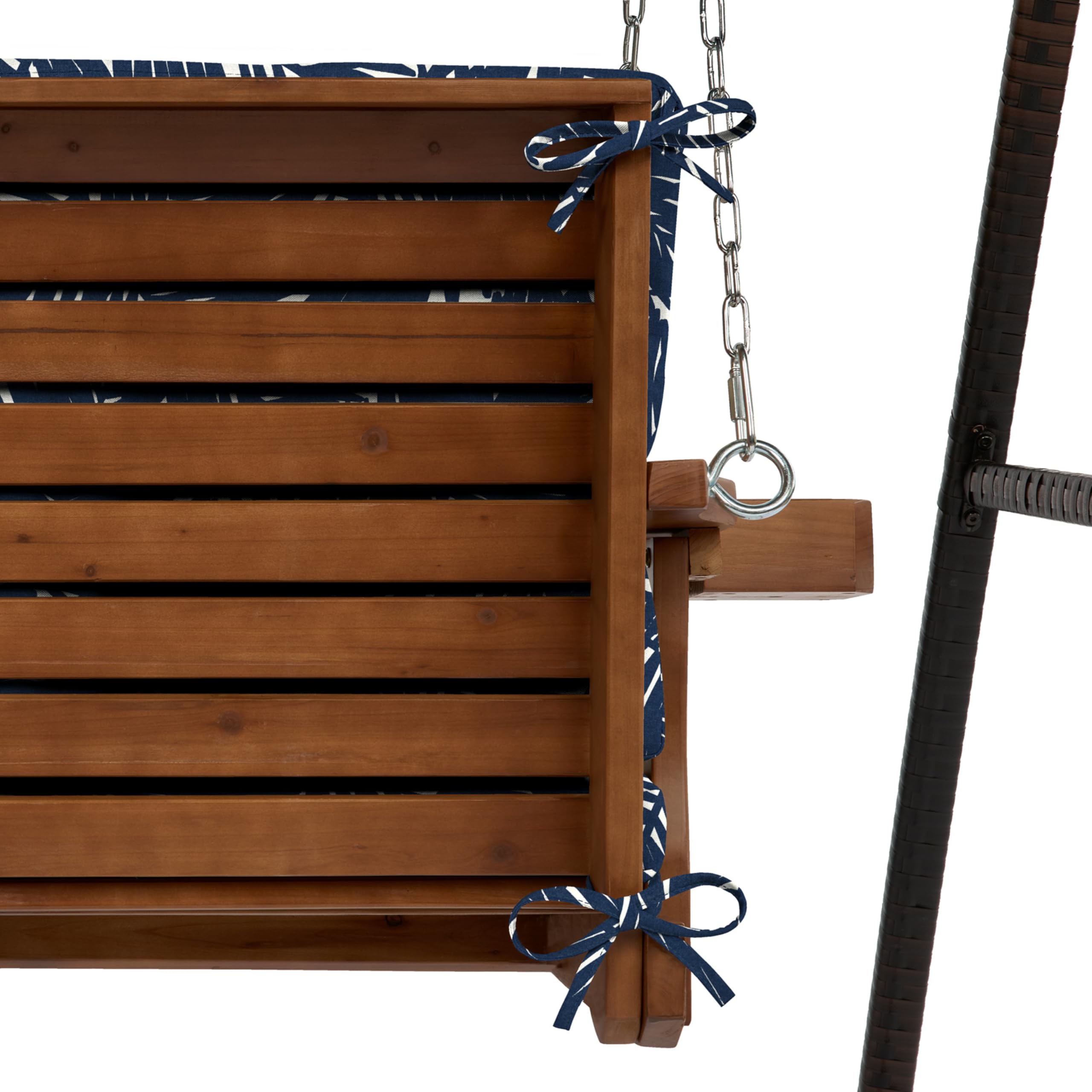 Arden Selections cushions on a porch swing showing weather-ready outdoor styling benefit