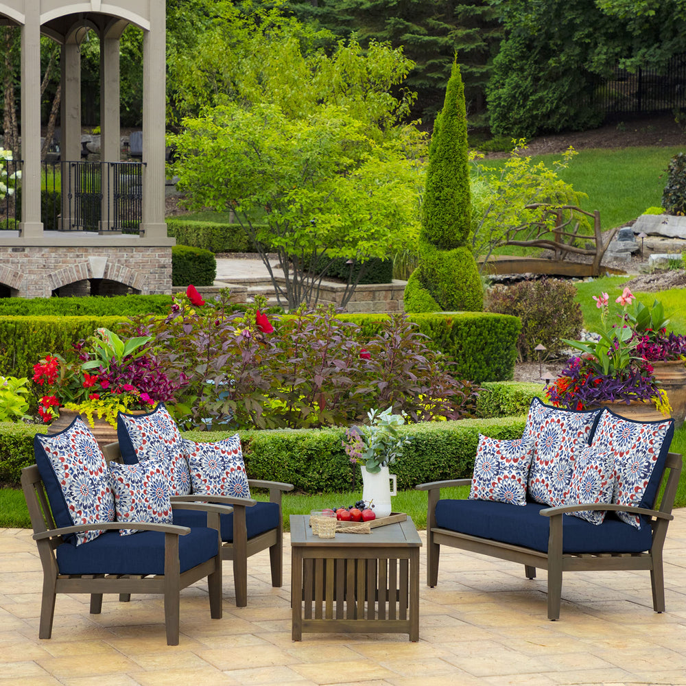 Arden Selections pillows poolside adding color and weather-ready styling