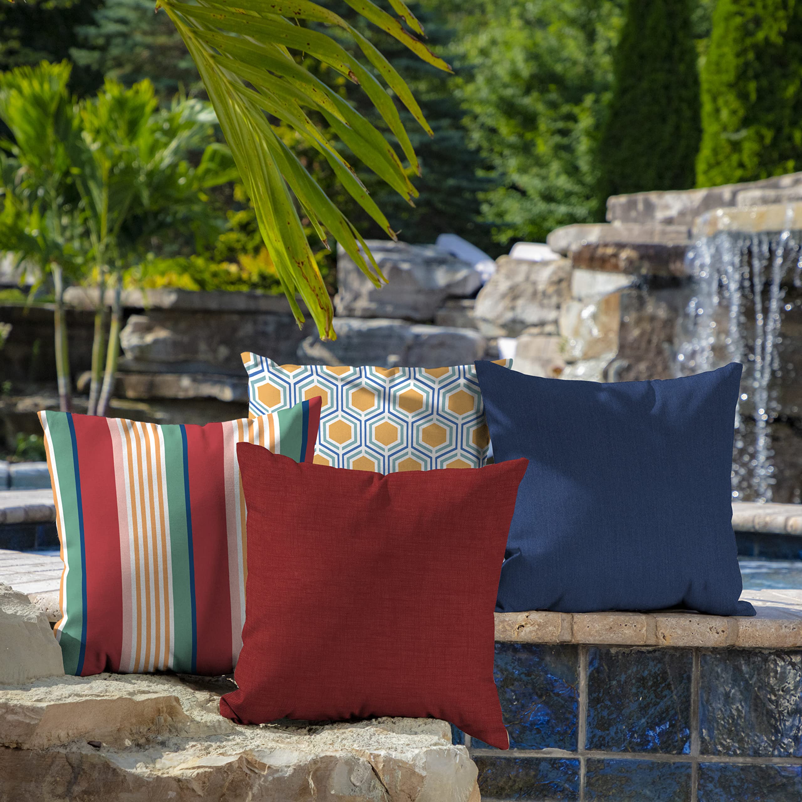 Arden Selections pillow size next to patio chair for scale and fit clarity